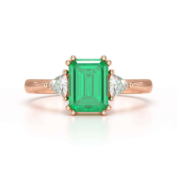 Emerald Trilogy Ring with Trillion side stone Dress Ring