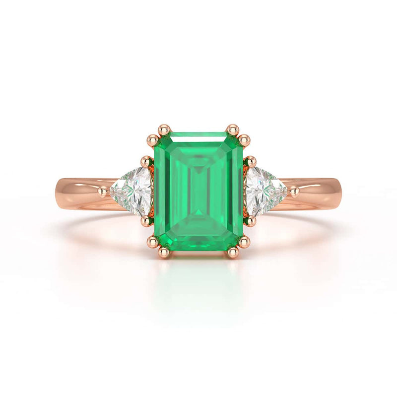 Emerald Trilogy Ring with Trillion side stone Dress Ring