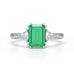 Emerald Trilogy Ring with Trillion side stone Dress Ring