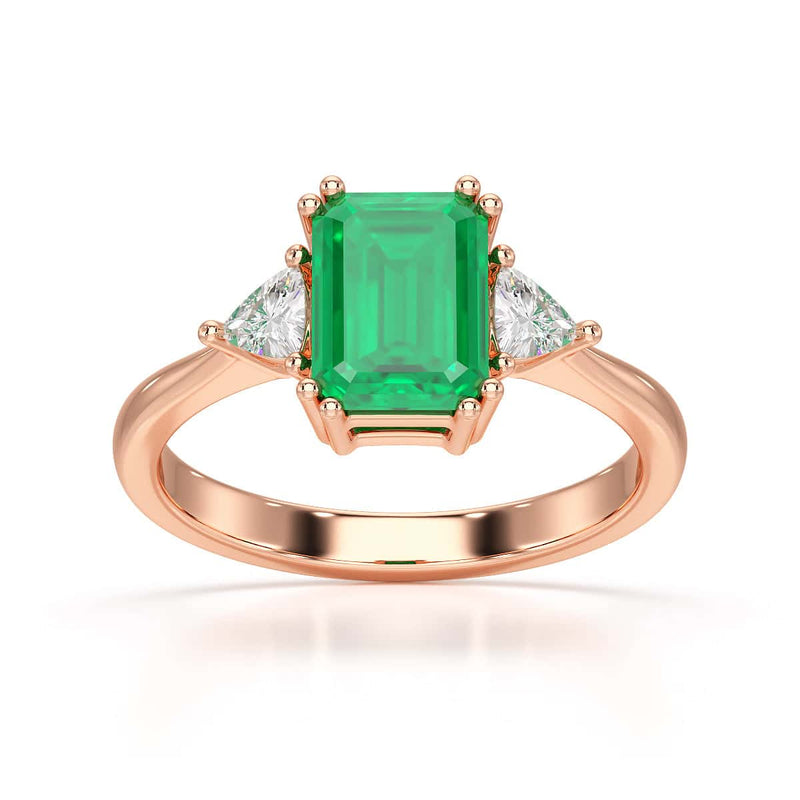 Emerald Trilogy Ring with Trillion side stone Dress Ring