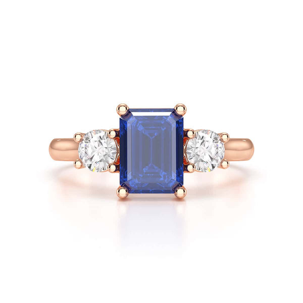 Sapphire trilogy with round side stone Dress ring