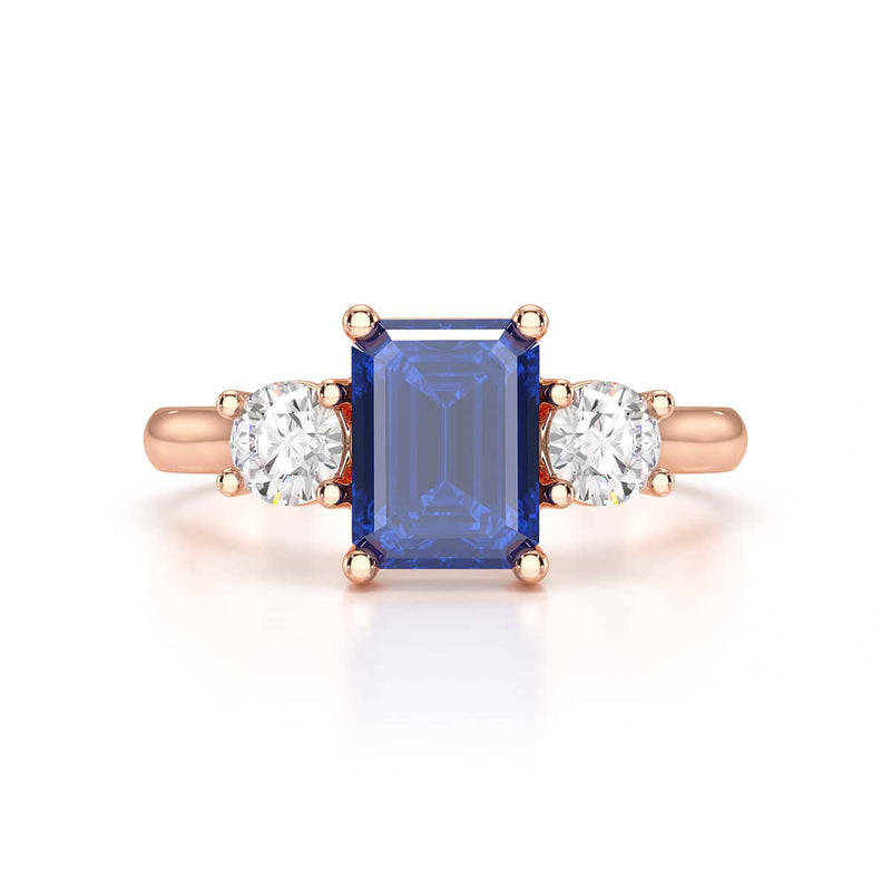 Sapphire trilogy with round side stone Dress ring