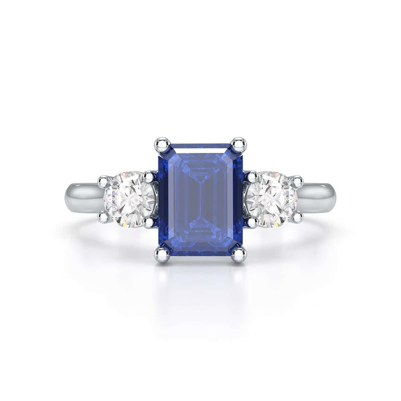Sapphire trilogy with round side stone Dress ring