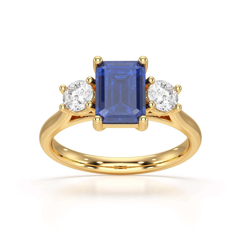 Sapphire trilogy with round side stone Dress ring