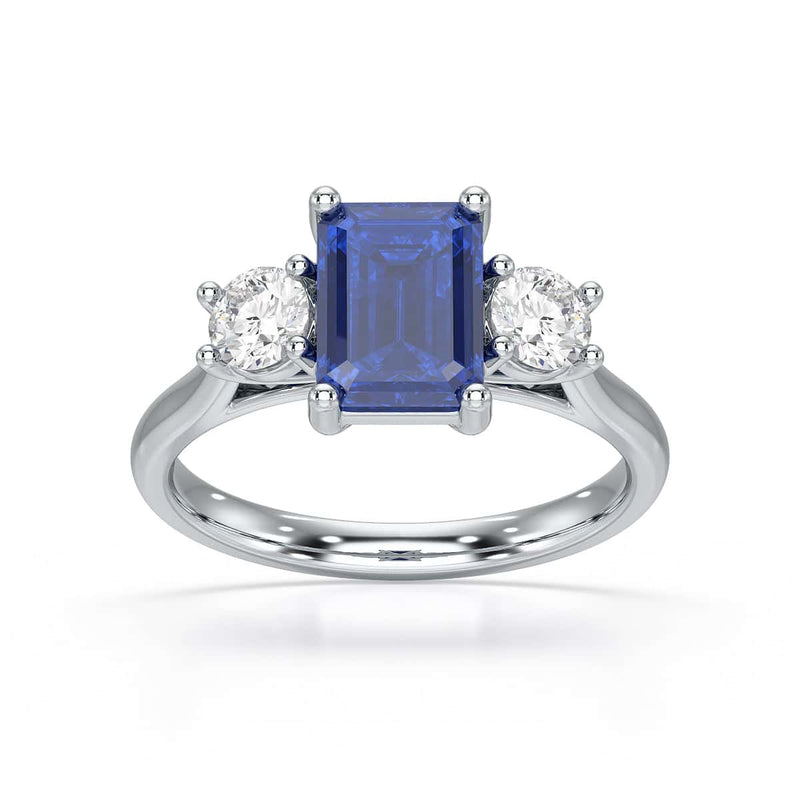 Sapphire trilogy with round side stone Dress ring