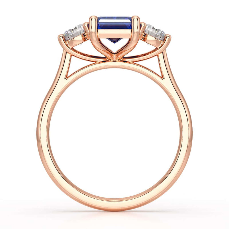 Sapphire trilogy with round side stone Dress ring