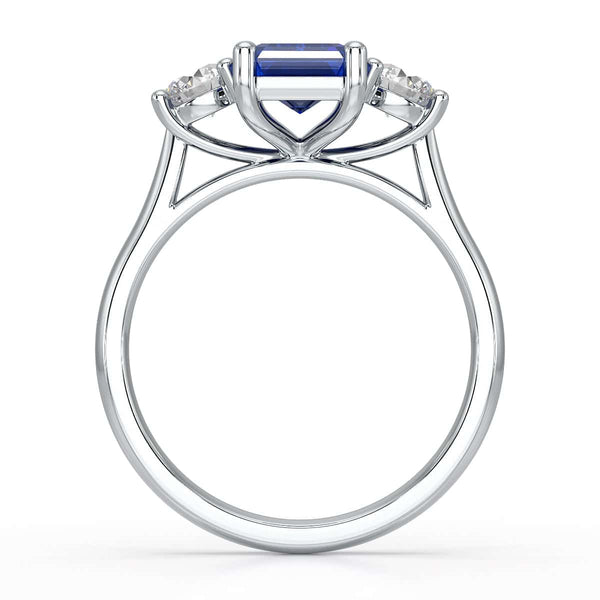 Sapphire trilogy with round side stone Dress ring