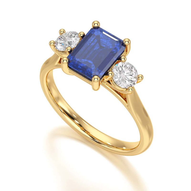 Sapphire trilogy with round side stone Dress ring
