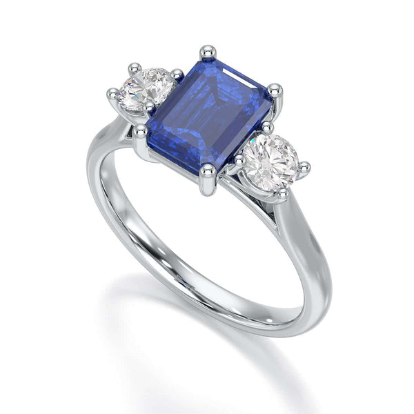 Sapphire trilogy with round side stone Dress ring