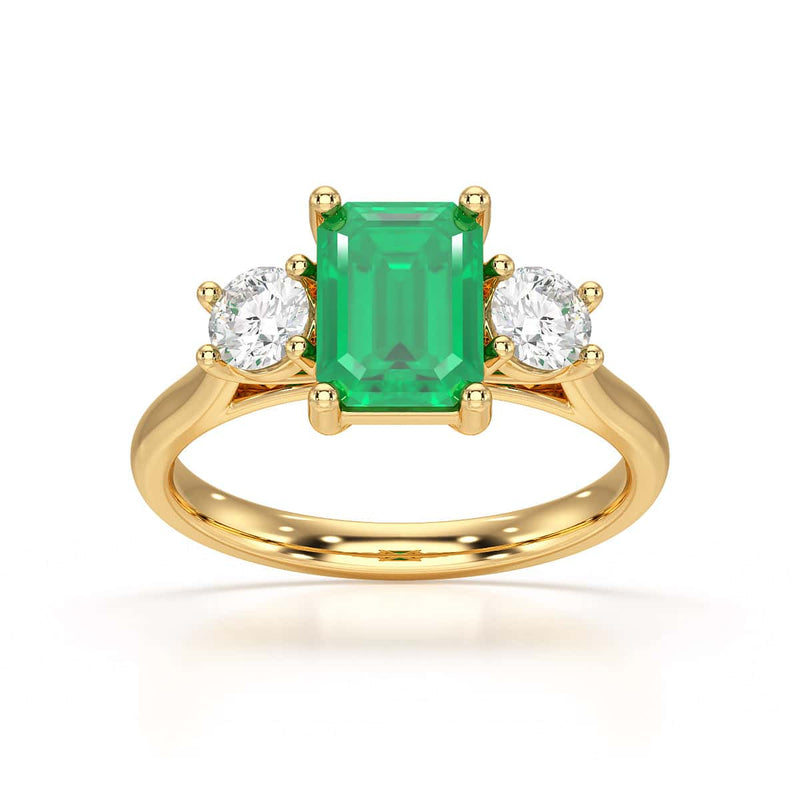 Emerald trilogy with round side stone Dress ring