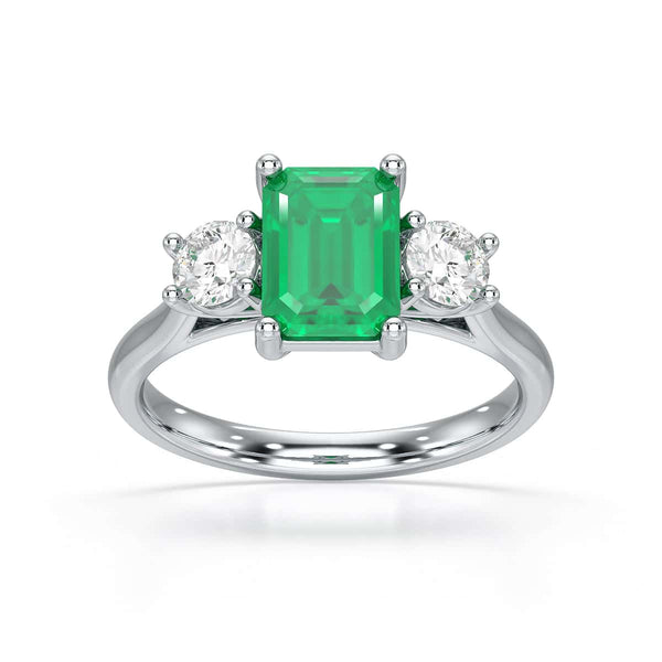 Emerald trilogy with round side stone Dress ring