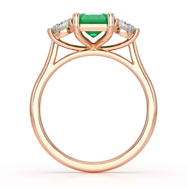 Emerald trilogy with round side stone Dress ring