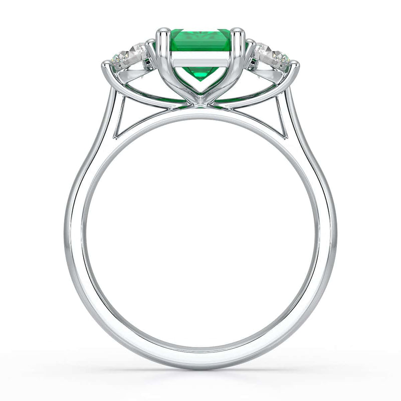 Emerald trilogy with round side stone Dress ring