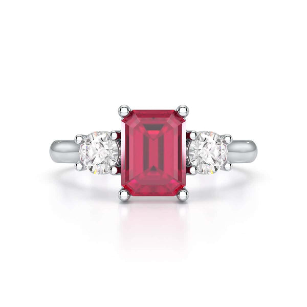 Ruby trilogy with round side stone Dress ring