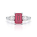Ruby trilogy with round side stone Dress ring