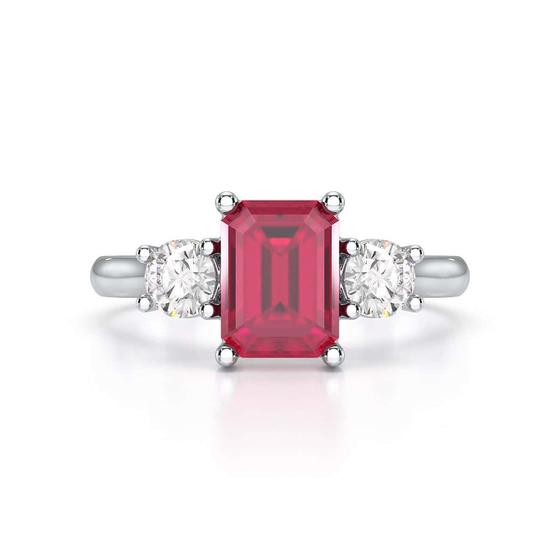 Ruby trilogy with round side stone Dress ring