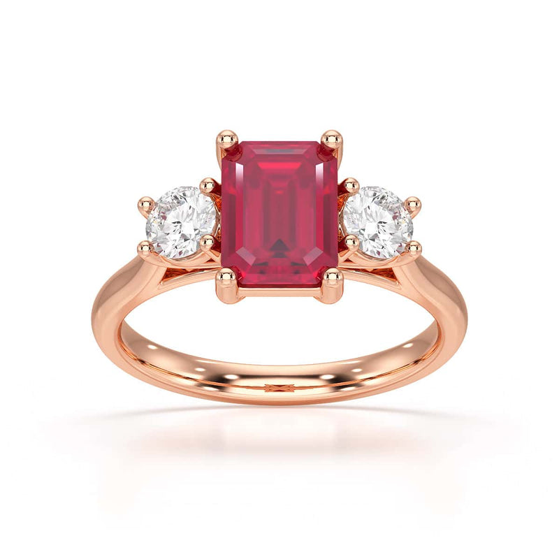 Ruby trilogy with round side stone Dress ring
