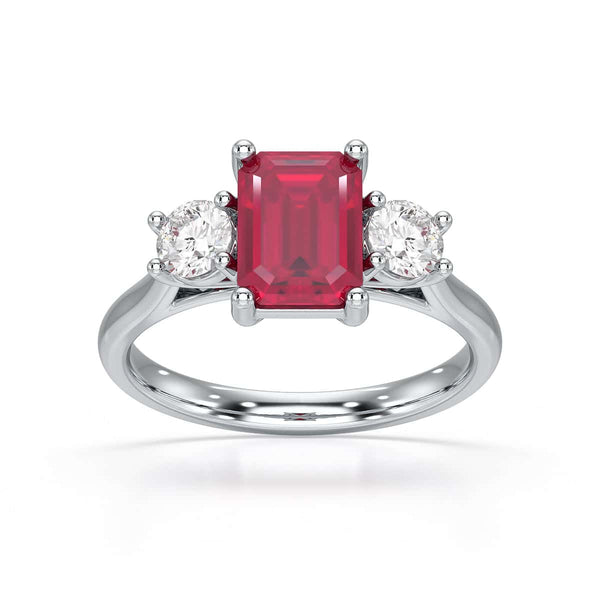 Ruby trilogy with round side stone Dress ring