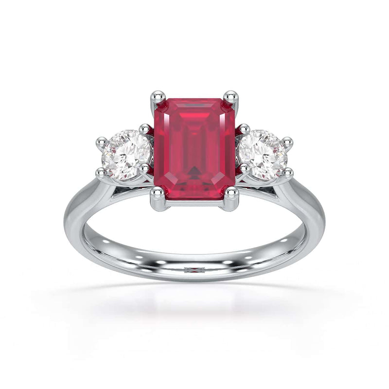 Ruby trilogy with round side stone Dress ring