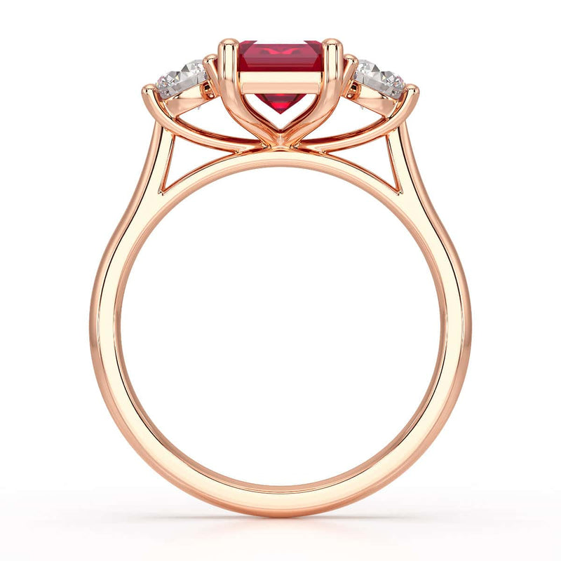 Ruby trilogy with round side stone Dress ring