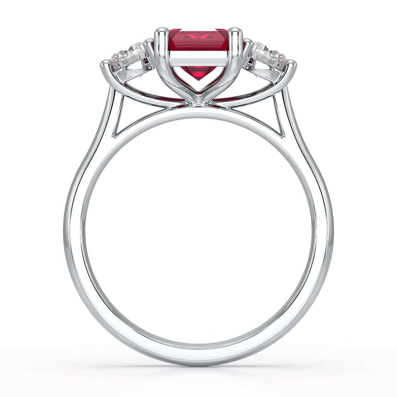 Ruby trilogy with round side stone Dress ring