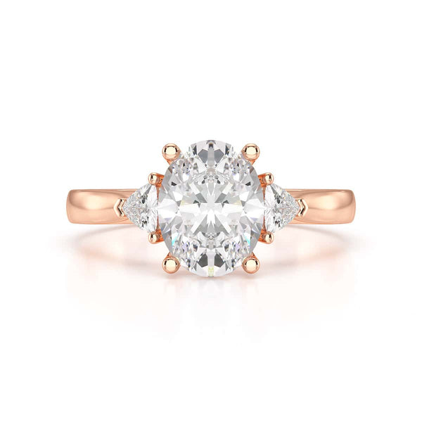 Oval Trilogy Engagement Ring with Trillion side stone