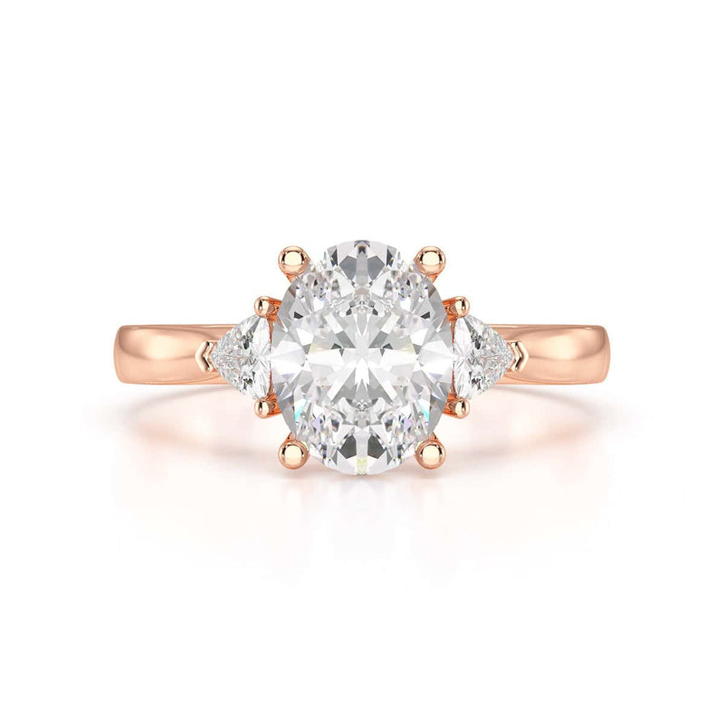 Oval Trilogy Engagement Ring with Trillion side stone