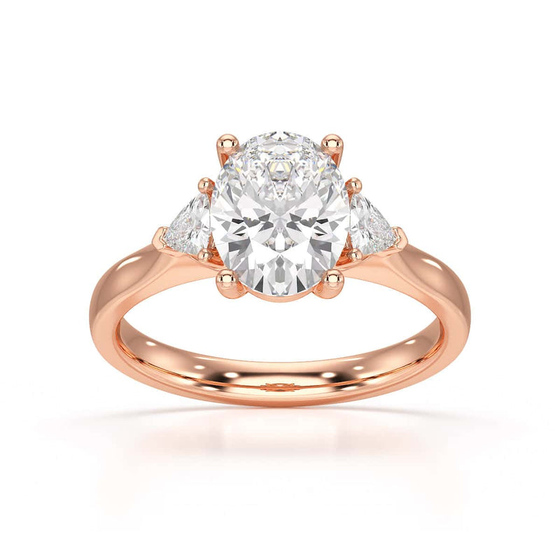 Oval Trilogy Engagement Ring with Trillion side stone
