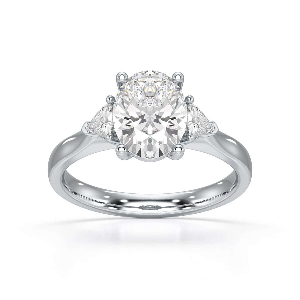 Oval Trilogy Engagement Ring with Trillion side stone