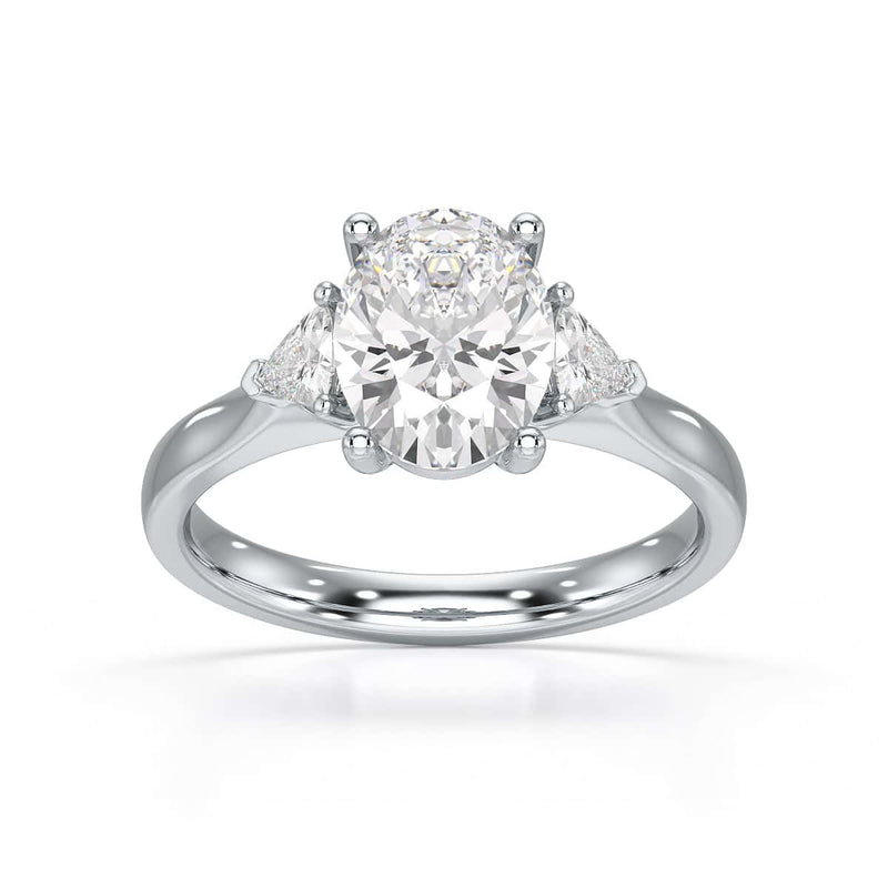 Oval Trilogy Engagement Ring with Trillion side stone