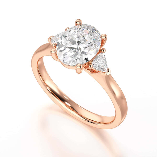 Oval Trilogy Engagement Ring with Trillion side stone