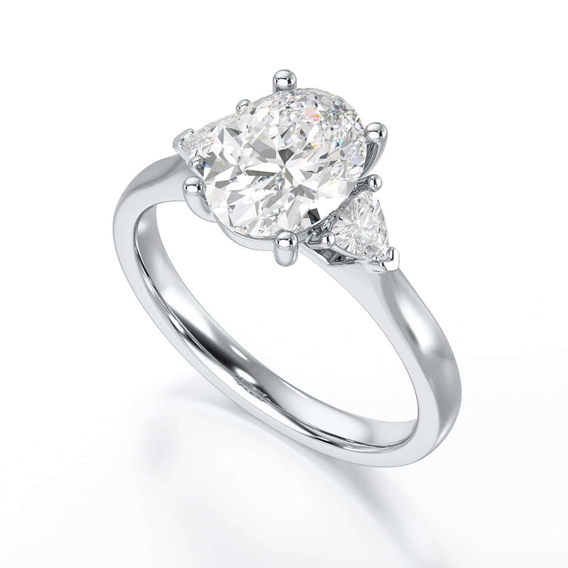Oval Trilogy Engagement Ring with Trillion side stone
