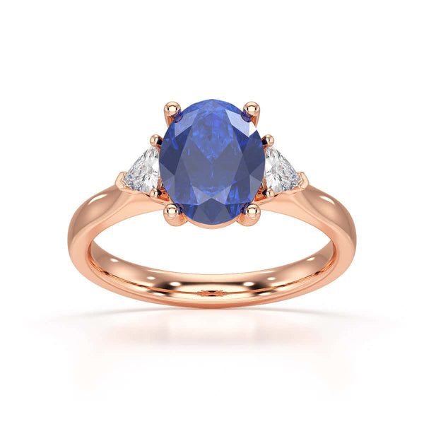 Sapphire trilogy with trillion cut side diamond Dress ring