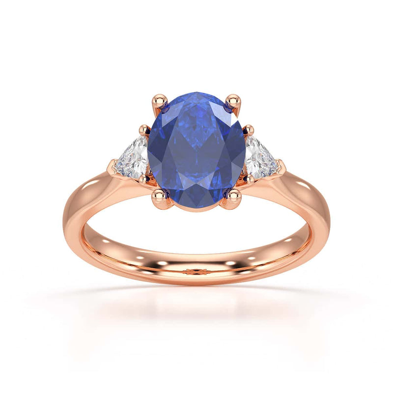 Sapphire trilogy with trillion cut side diamond Dress ring