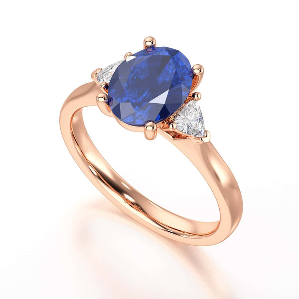 Sapphire trilogy with trillion cut side diamond Dress ring