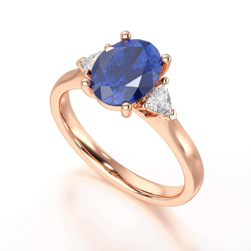 Sapphire trilogy with trillion cut side diamond Dress ring