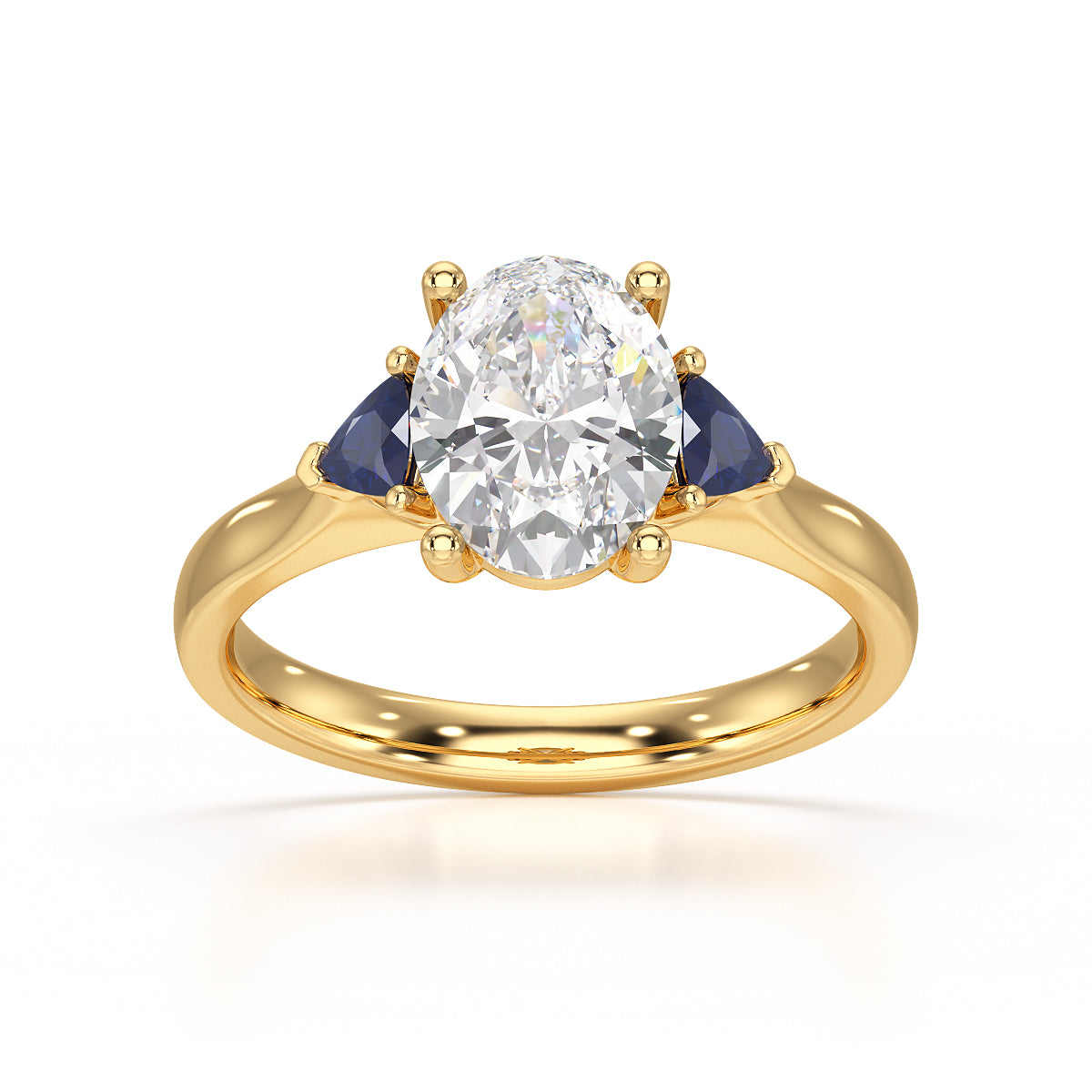Oval trilogy with trillion blue sapphire side stones Dress ring
