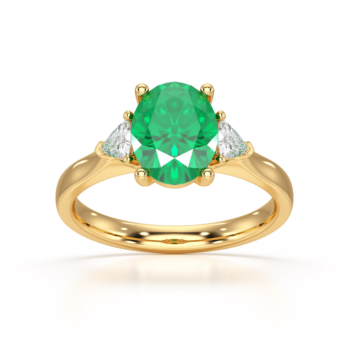 Emerald trilogy with trillion cut side diamond Dress ring Manna Jewellers Ltd