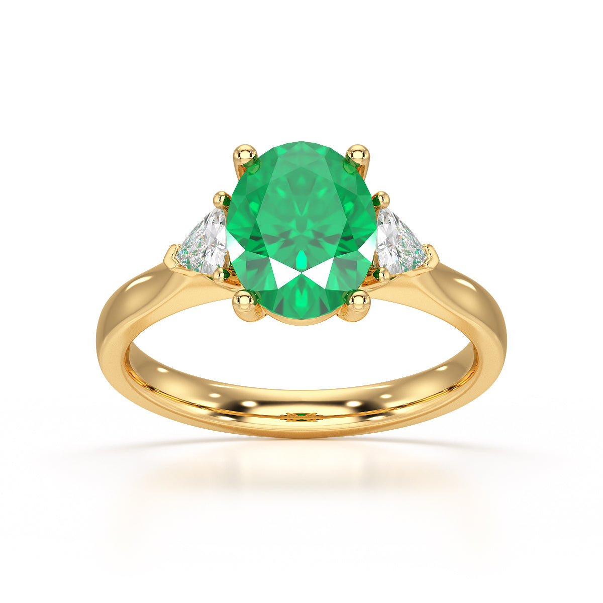 Emerald trilogy with trillion cut side diamond Dress ring