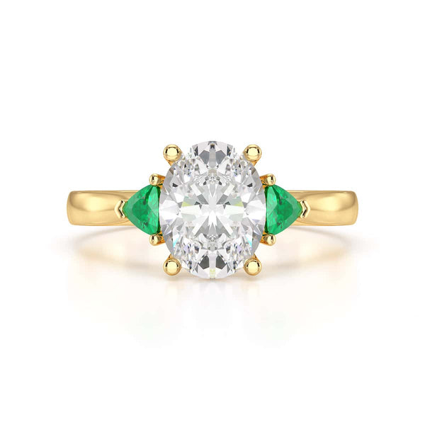 Oval trilogy with trillion side stones Dress ring