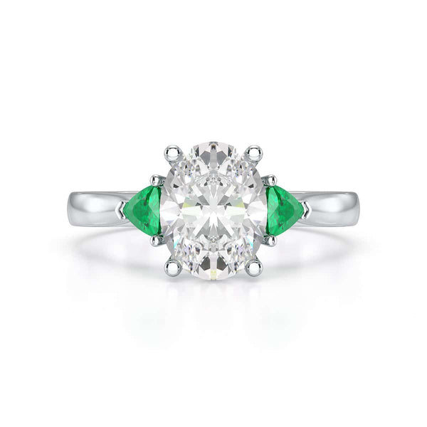 Oval trilogy with trillion side stones Dress ring