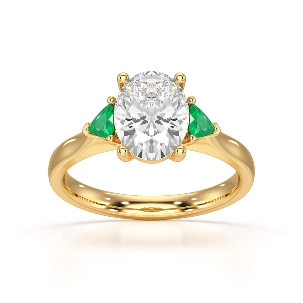 Oval trilogy with trillion side stones Dress ring