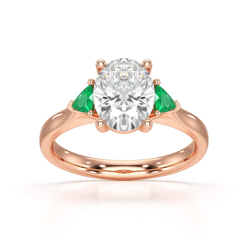 Oval trilogy with trillion side stones Dress ring