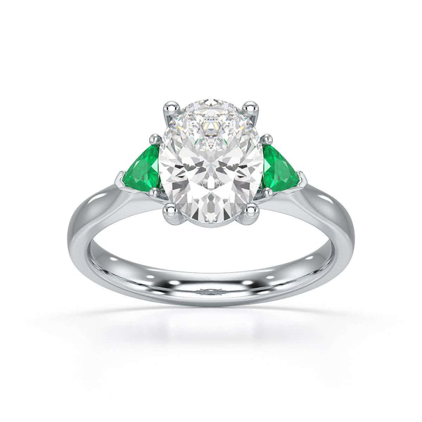 Oval trilogy with trillion side stones Dress ring