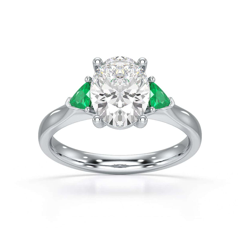 Oval trilogy with trillion side stones Dress ring