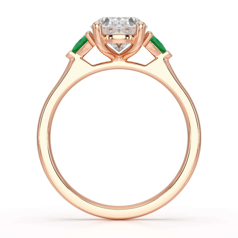 Oval trilogy with trillion side stones Dress ring