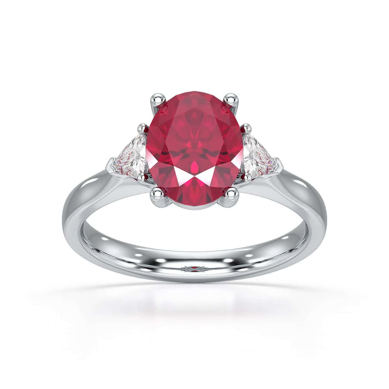 Ruby trilogy with trillion cut side diamond Dress ring