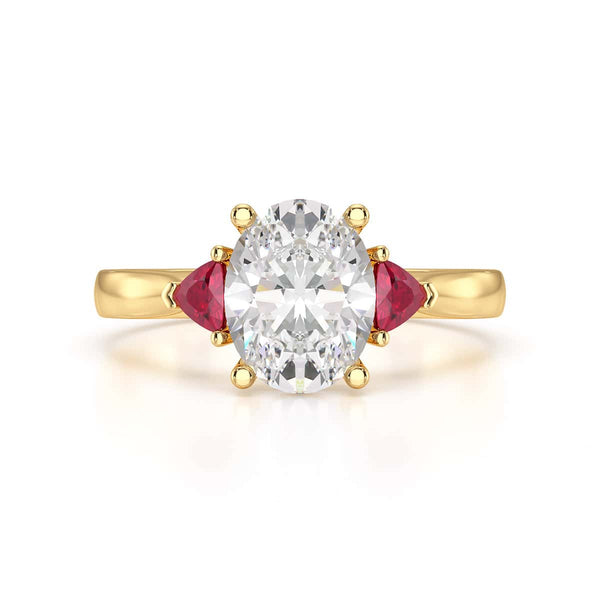 Oval trilogy engagement ring with trillion shape ruby