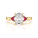 Oval trilogy engagement ring with trillion shape ruby