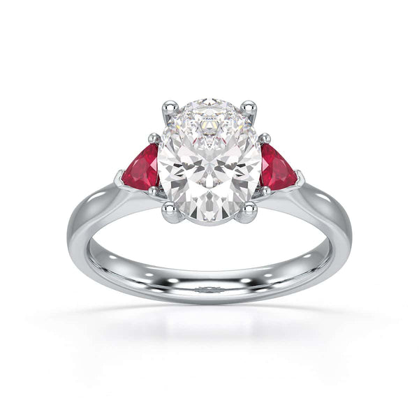 Oval trilogy engagement ring with trillion shape ruby